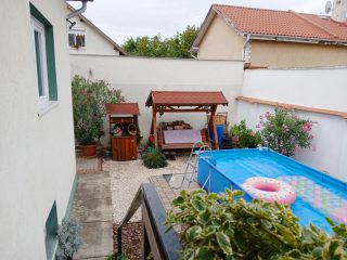 Eladó 155 m²-escsaládi ház XX. Kerület (Erzsébetfalva) , Csendes mellékutcában: 128'500'000 Ft